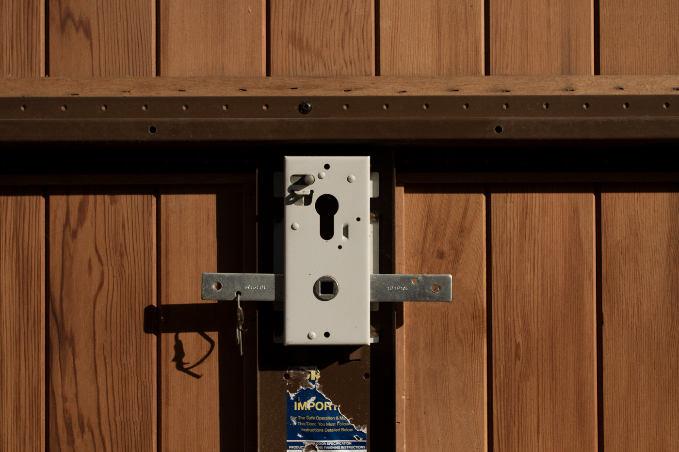 Hormann 2009 Vertical Basecoat Treated Retractable Garage Door in Timber